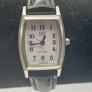 Q&Q Quartz Watch with White Dial and Black Leather Look Strap. 8 inches